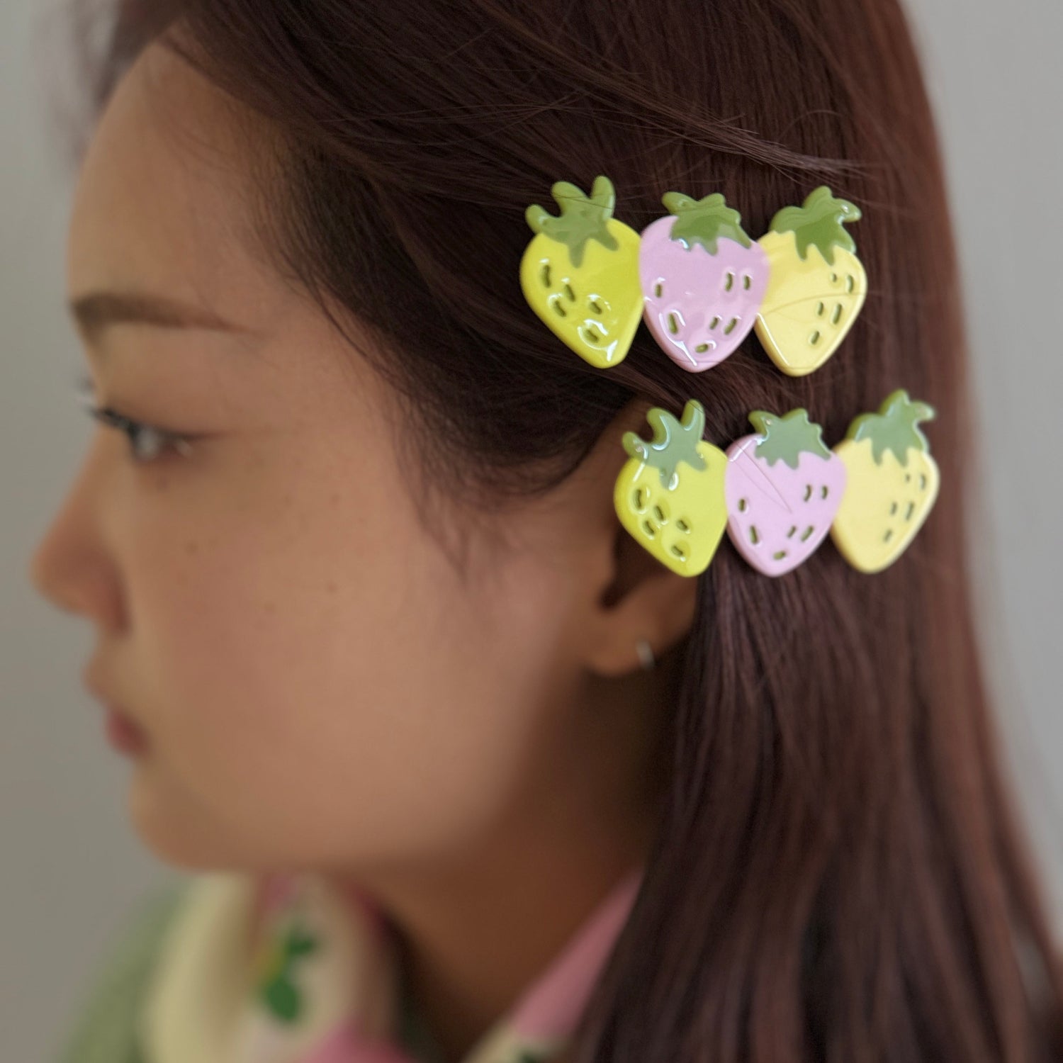 Keep the strawberry love flowing with these delicious pastel summer strawberries alligator hair clip to decor your hair do.